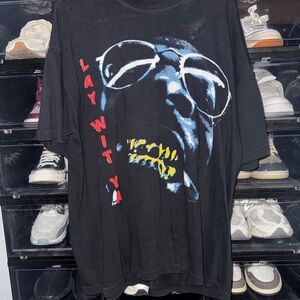 tde. Black Graphic Tee with Red and Yellow Accents